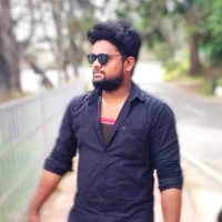 Dinesh E